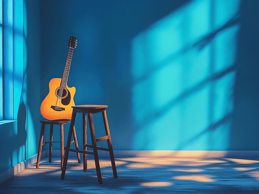 Carlos Santana smiling and holding a guitar backstage
