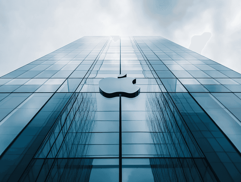 A sleek Apple logo on a modern building with a cloudy sky in the background