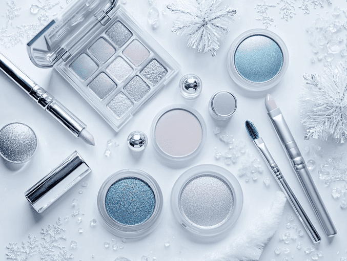 A makeup palette with frosty silver and blue shades
