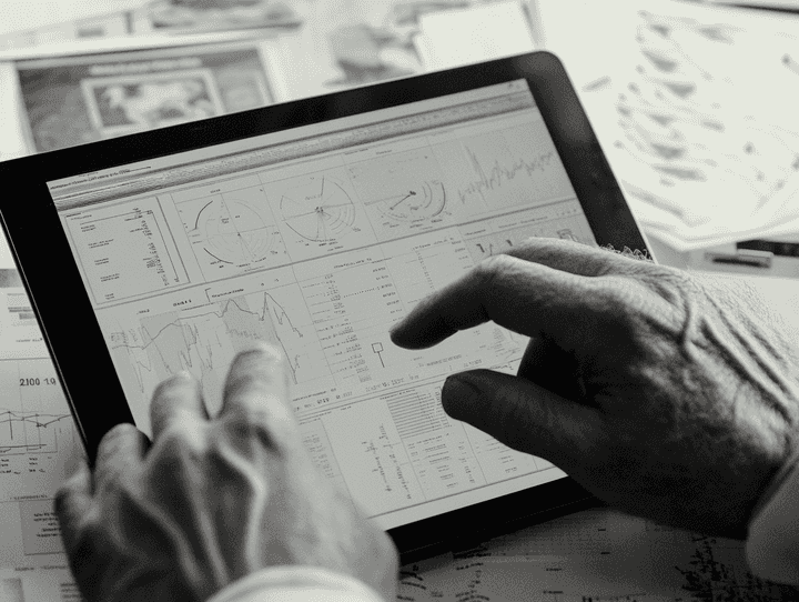 A diverse group of people discussing charity initiatives